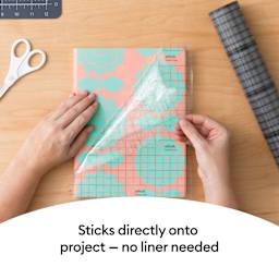 Cricut Linerless Transfer Tape, pealing of linerless tape from project