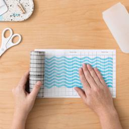 Cricut Joy Linerless Transfer Tape - 5.5" x 10 ft, placing tape over printed design