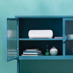 Cricut Joy Xtra stored inside cabinet