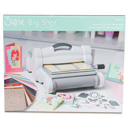 Sizzix Big Shot Plus Machine Starter Kit in use on table