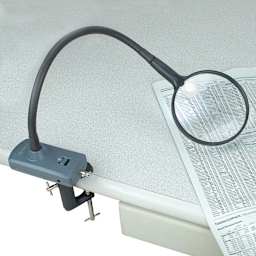 Carson MagniFlex LED Magnifier in use on table