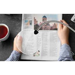 Daylight Flexi Magnifier - in use, reading a magazine