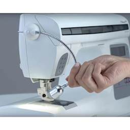 Daylight Sewing Machine Lamp - attached to a white sewing machine