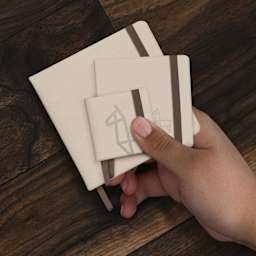 Etchr Mini Sketchbooks held in hand