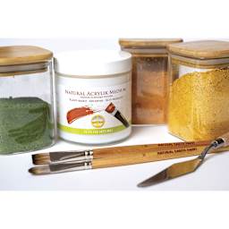 Natural Earth Paint Natural Acrylik Medium - next to jars of dry pigments, brushes, and palette knife