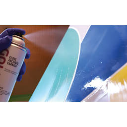 Golden MSA Archival Spray Varnish being applied to artwork.