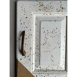 Fleur Terrazzo Effect Flakes used in a paint medium to decorate a cabinet door.