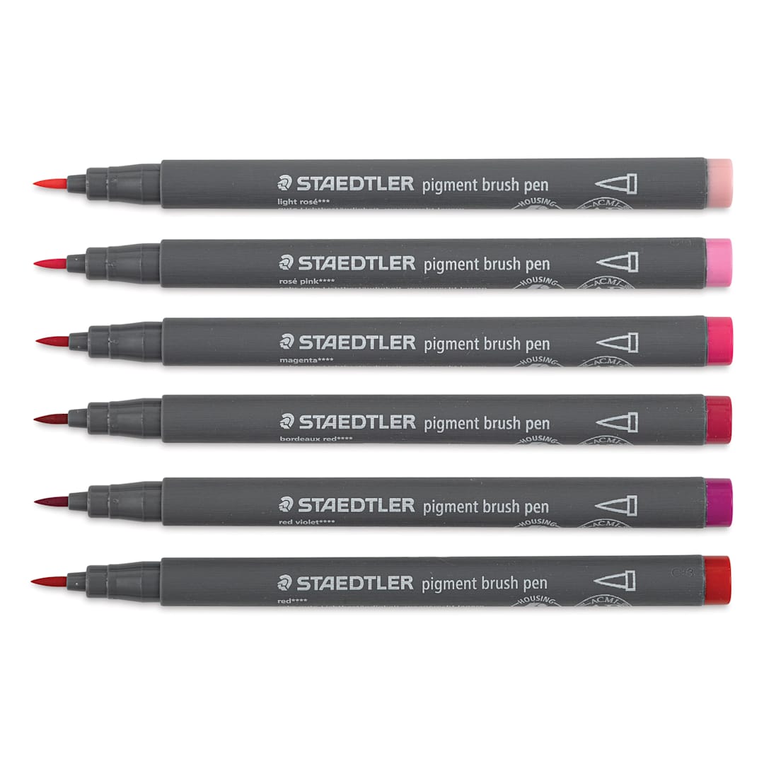 Open in modal - Staedtler Pigment Arts Brush Pens - Reds and Pinks, Set of 6 pens laid out with caps off