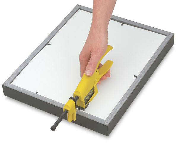 Open in modal - Logan Framing Fitting Tool Angled view of Framing Fitting Tool driving points into frame