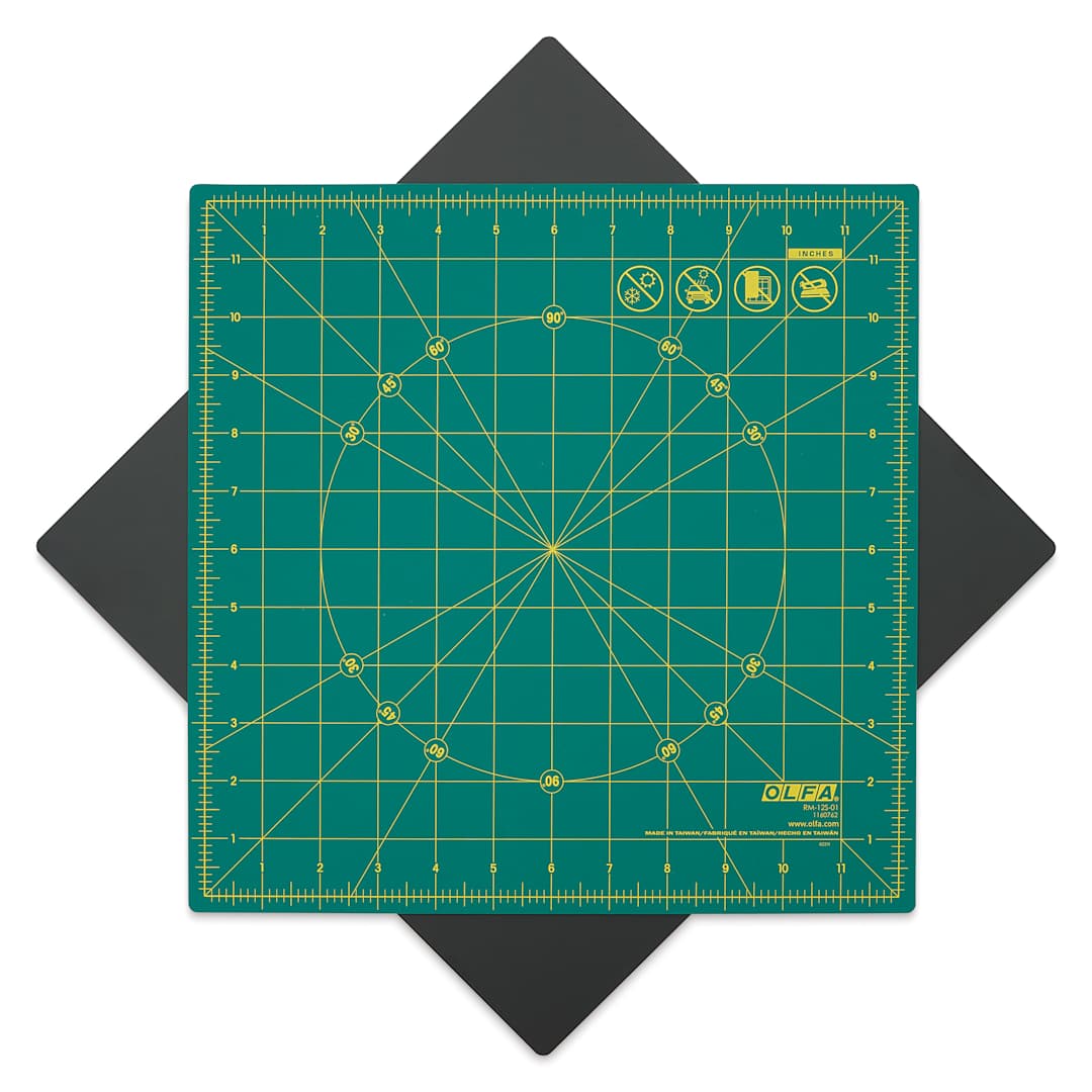 Open in modal - Olfa Rotating Cutting Mat, 12" x 12" - self-healing cutting mat rotated 45° on included non-slipping mat