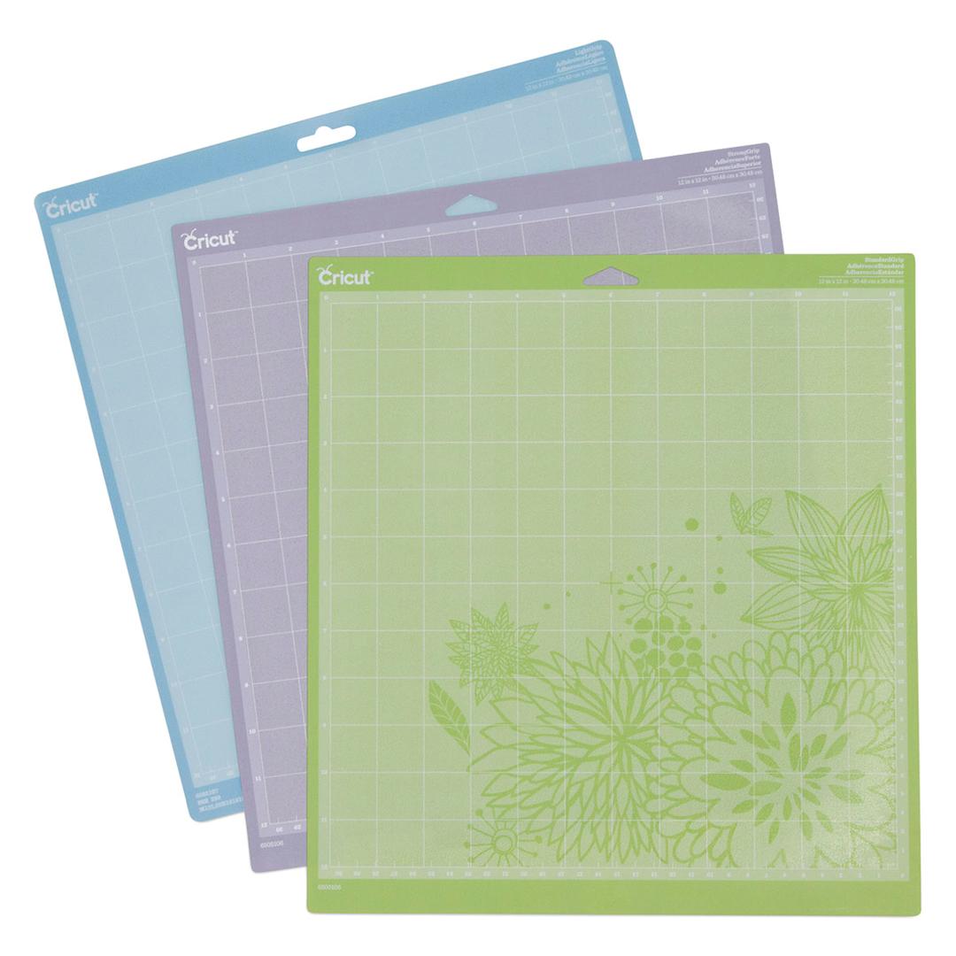 Open in modal - Cricut Adhesive Cutting Mats - Components of Package of 3 Cutting Mats shown together, spread in fan