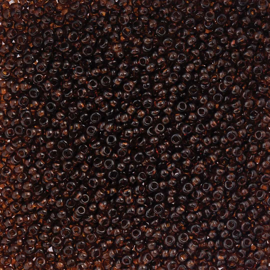 Open in modal - John Bead Czech Glass Seed Beads - Transparent Brown, 10/0, 22 g Vial close up
