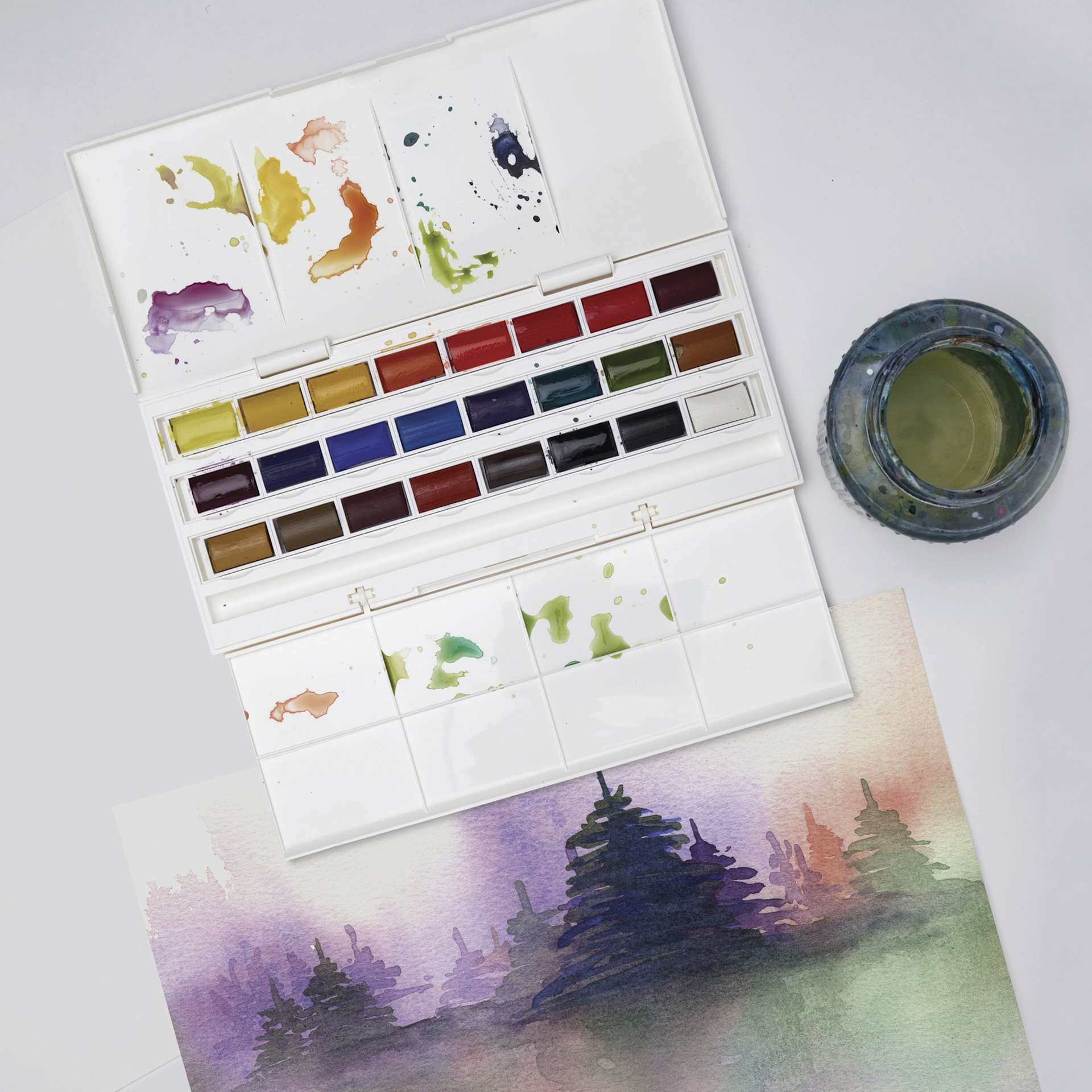 Winsor & Newton Cotman Watercolors- Studio Set of 24, Assorted Colors, Full Pans, on desk
