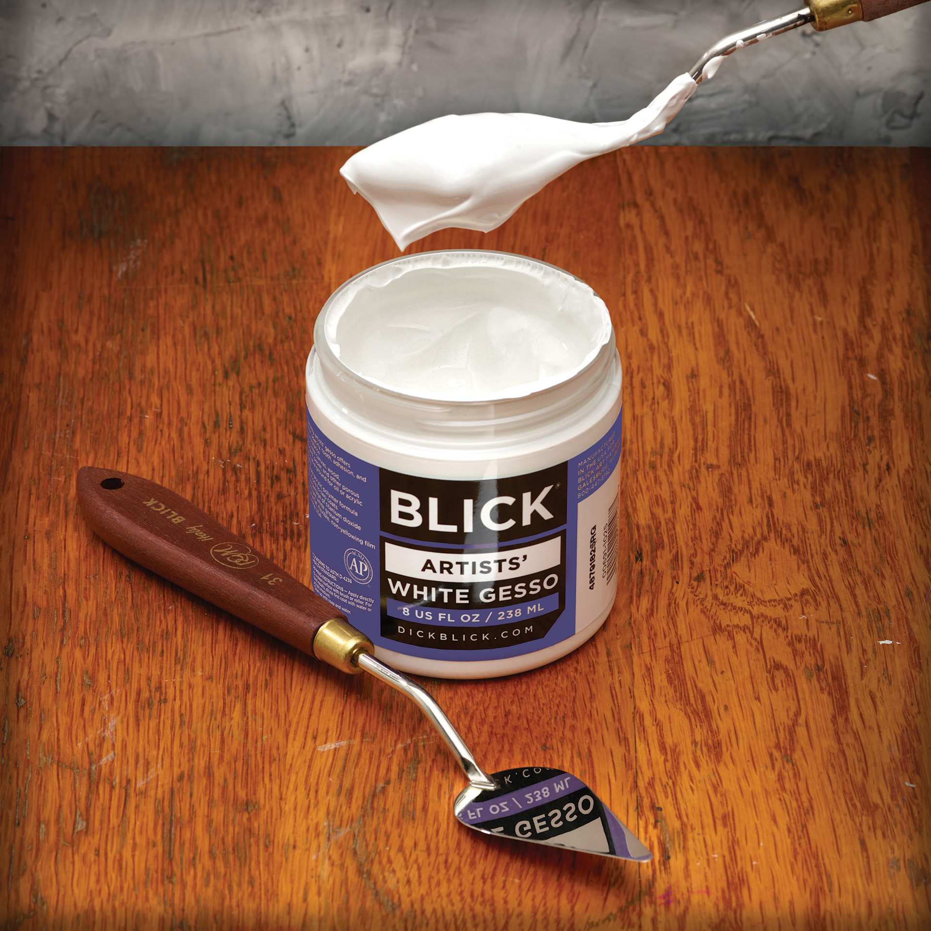 Blick Artists Acrylic Gesso - White, 8 oz jar, showing viscosity