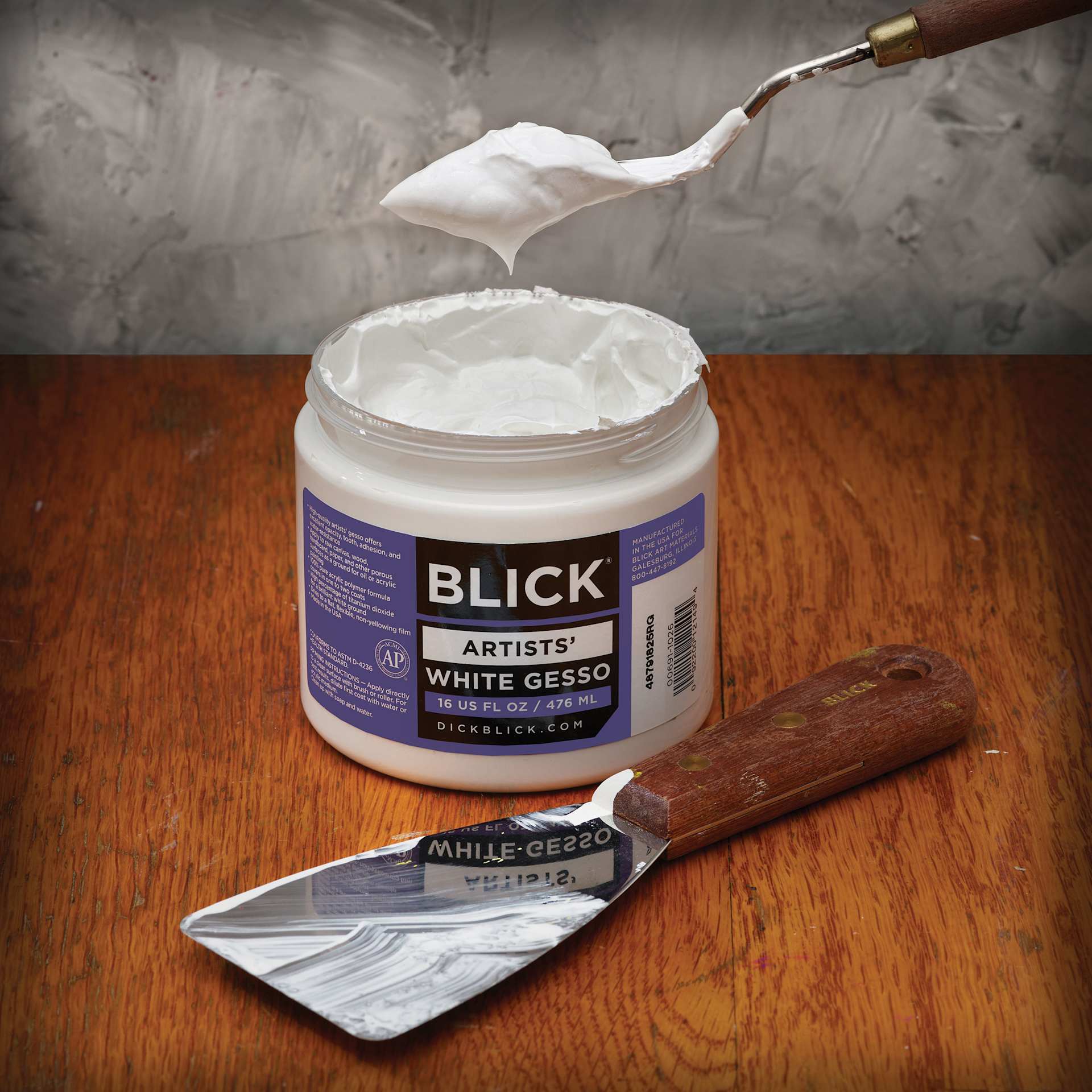 Blick Artists Acrylic Gesso - White, 16 oz jar, showing viscosity