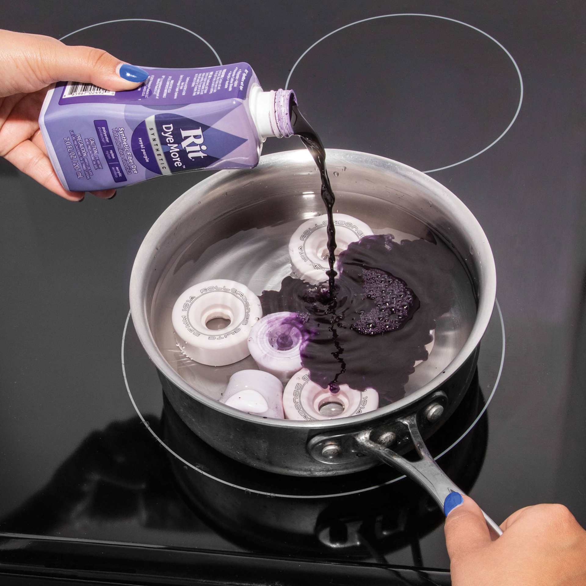 Rit DyeMore Synthetic Fiber Dye - Royal Purple, 7 oz, pouring dye in water