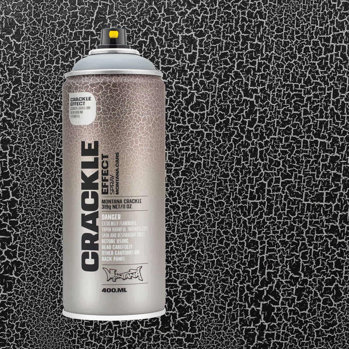 Montana Crackle Effect Spray - Squirrel Grey Spray can on swatch showing crackle effect possible Montana Crackle Effect Spray - Squirrel Grey Spray can on swatch showing crackle effect possible