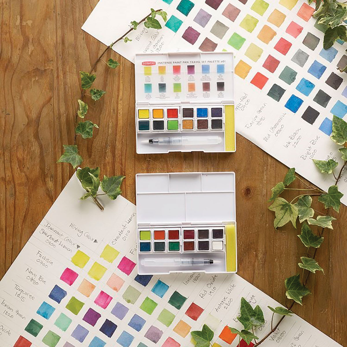 Derwent Inktense Paint Pan Set - 2 Open 12 pc sets shown on color swatches
Derwent Inktense Paint Pan Set - 2 Open 12 pc sets shown on color swatches