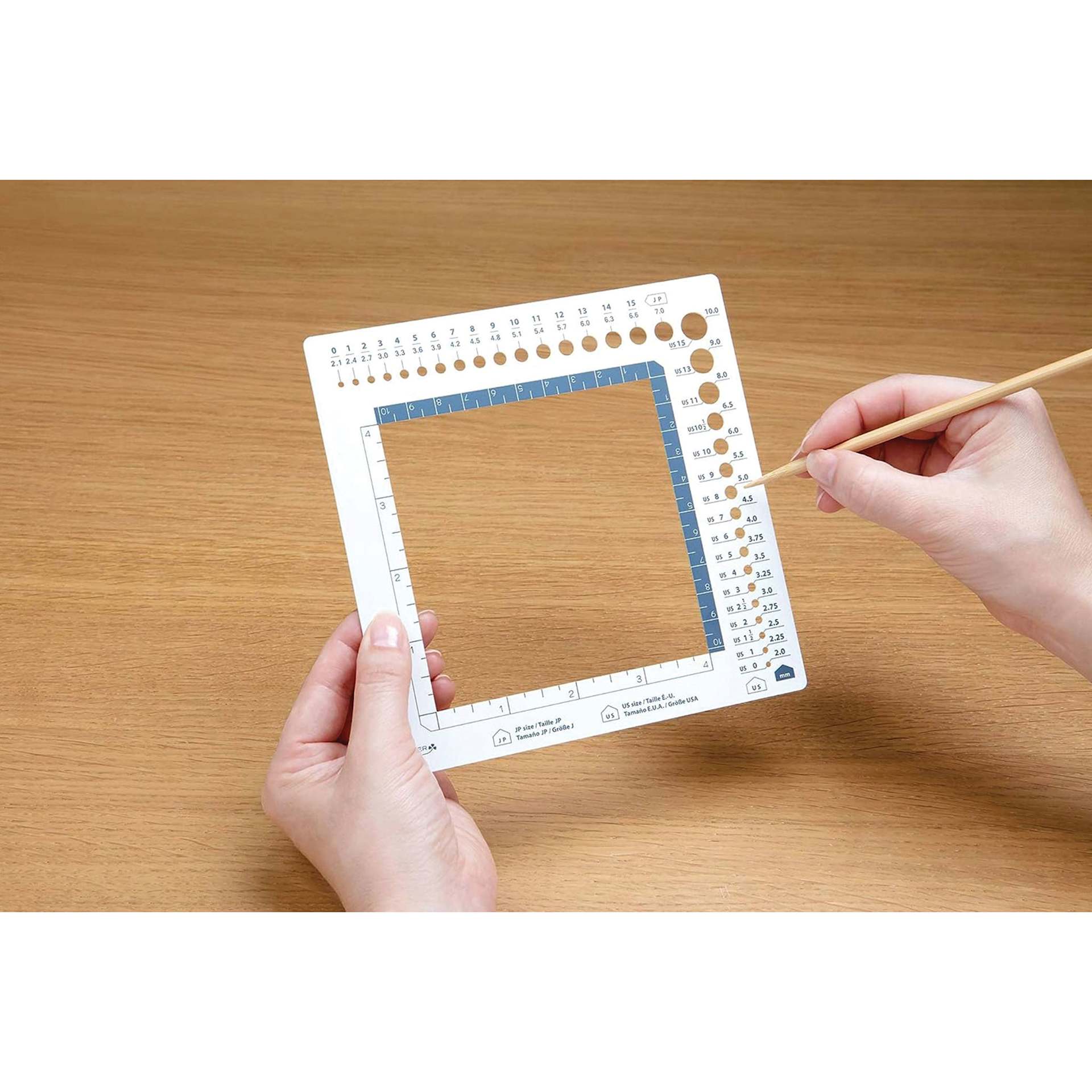Clover Swatch Ruler & Needle Gauge knitting needle gauge in use