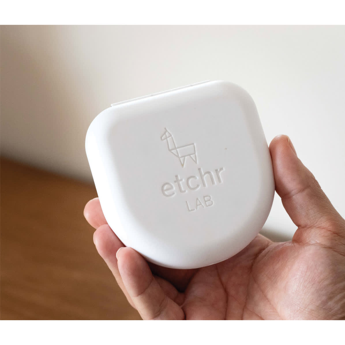 Etchr Travel Pocket Palette, closed palette held in hand