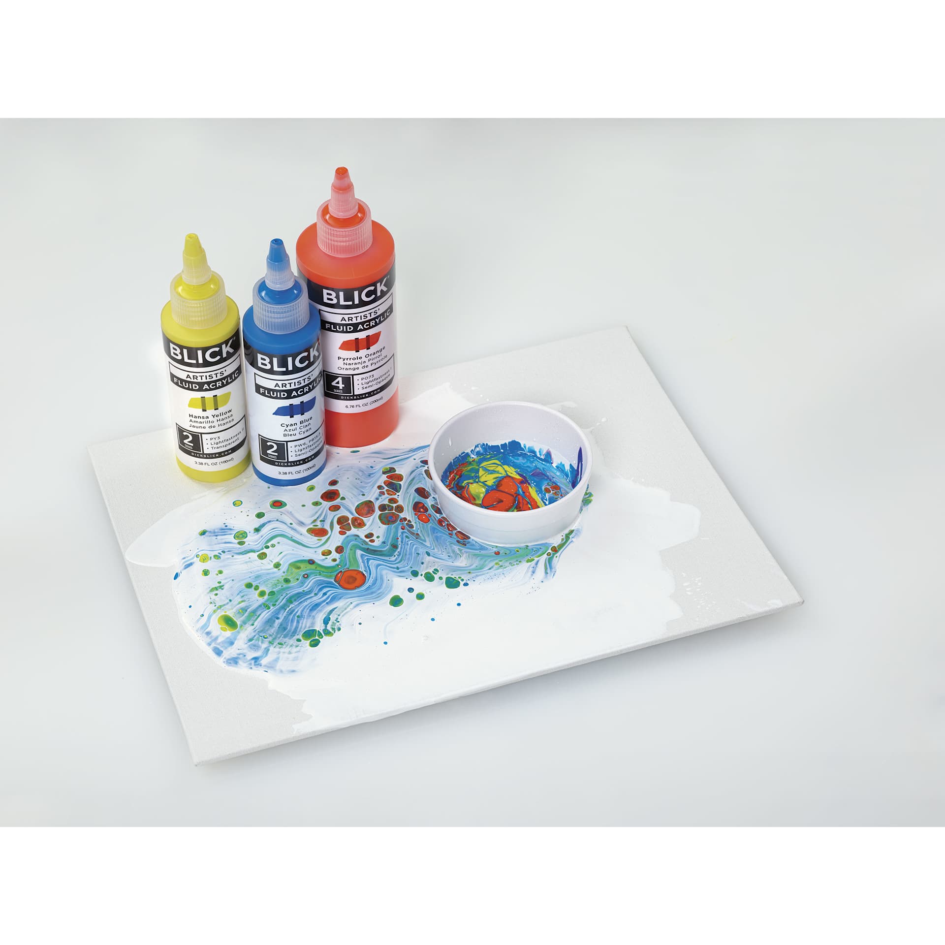 Blick Artists’ Fluid Acrylics, bottles with a painted canvas panel Blick Artists’ Fluid Acrylics, bottles with a painted canvas panel