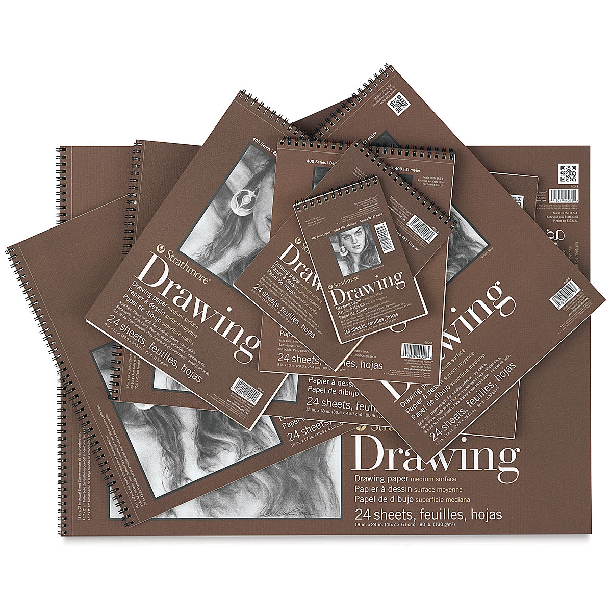 Strathmore 400 Series Drawing Paper Pads - Uneven stack of eight pads, brown covers, assorted sizes. Strathmore 400 Series Drawing Paper Pads - Uneven stack of eight pads, brown covers, assorted sizes.