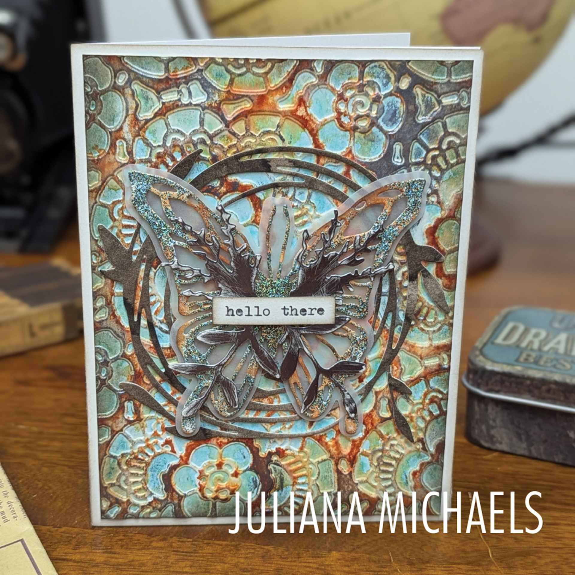 Sizzix Multi Level Textured Impressions Embossing Folder - Vault Lace, 4-1/2" x 6-1/2" showing completed butterfly project by Juliana Michaels
