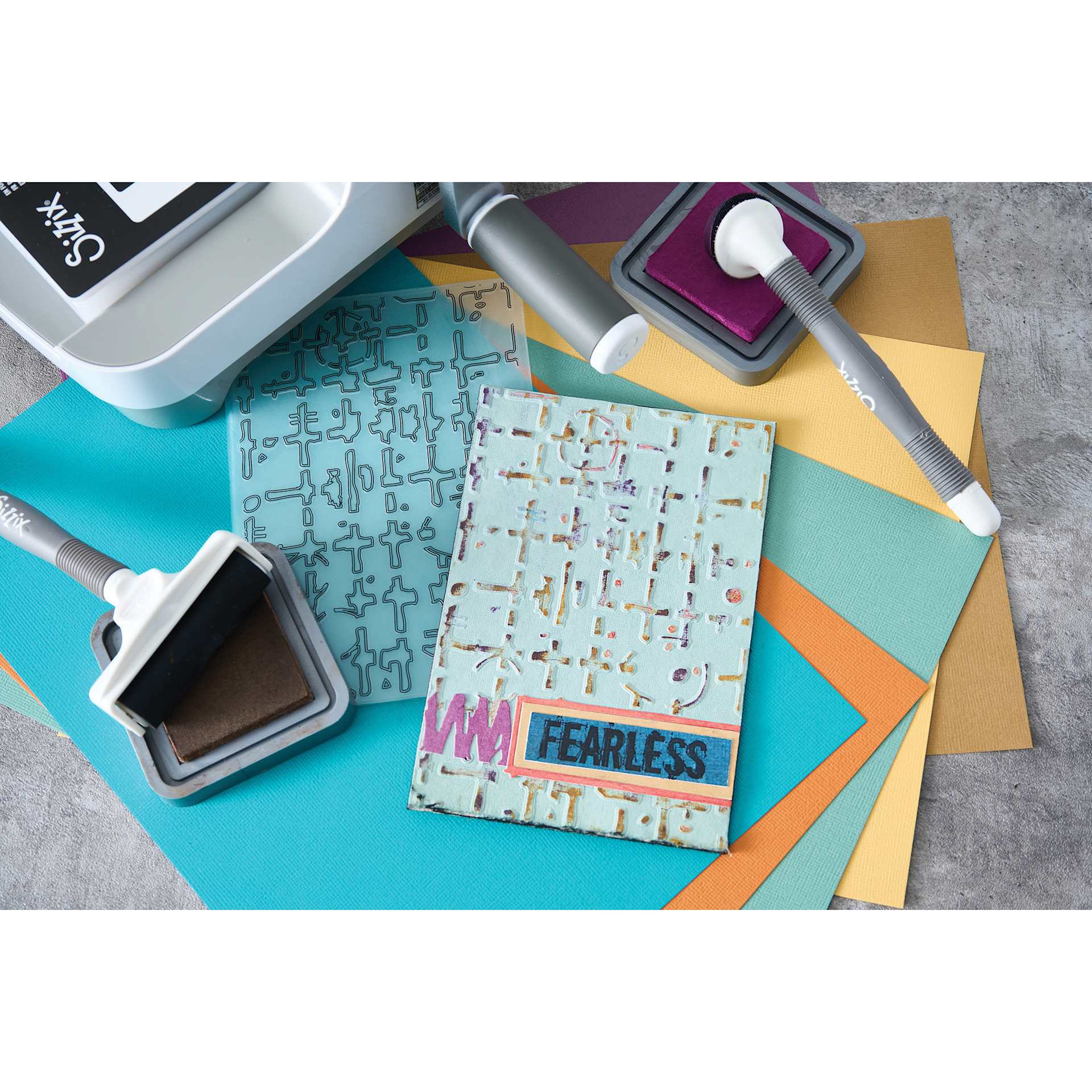 Sizzix Multi Level Textured Impressions Embossing Folder - Grid Graph, 4-1/2" x 6-1/2" showing completed project