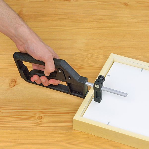 Frame Mate Framing Tool - Hand using tool on back of frame