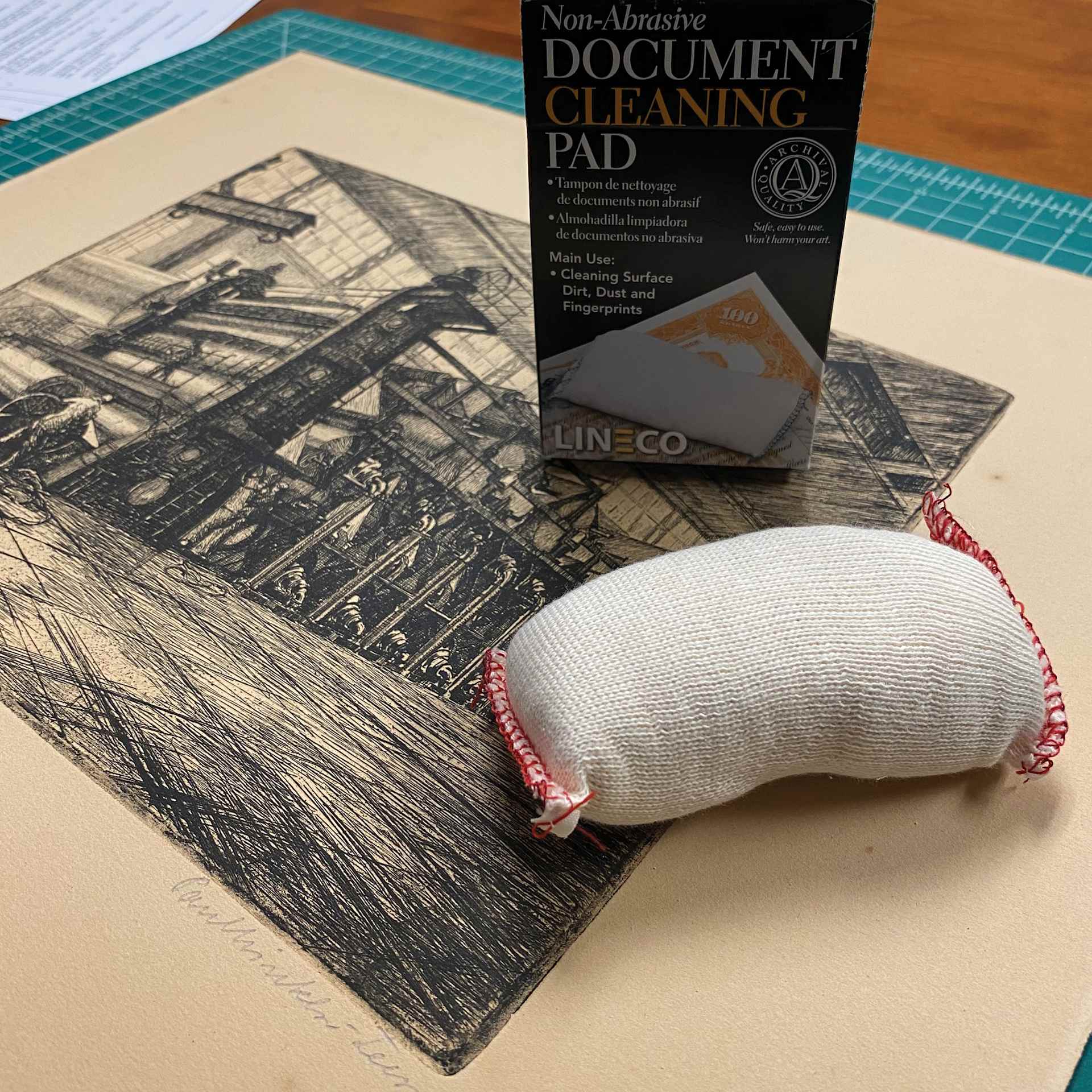 Lineco Document Cleaning Pad, in use on top of print (not included)