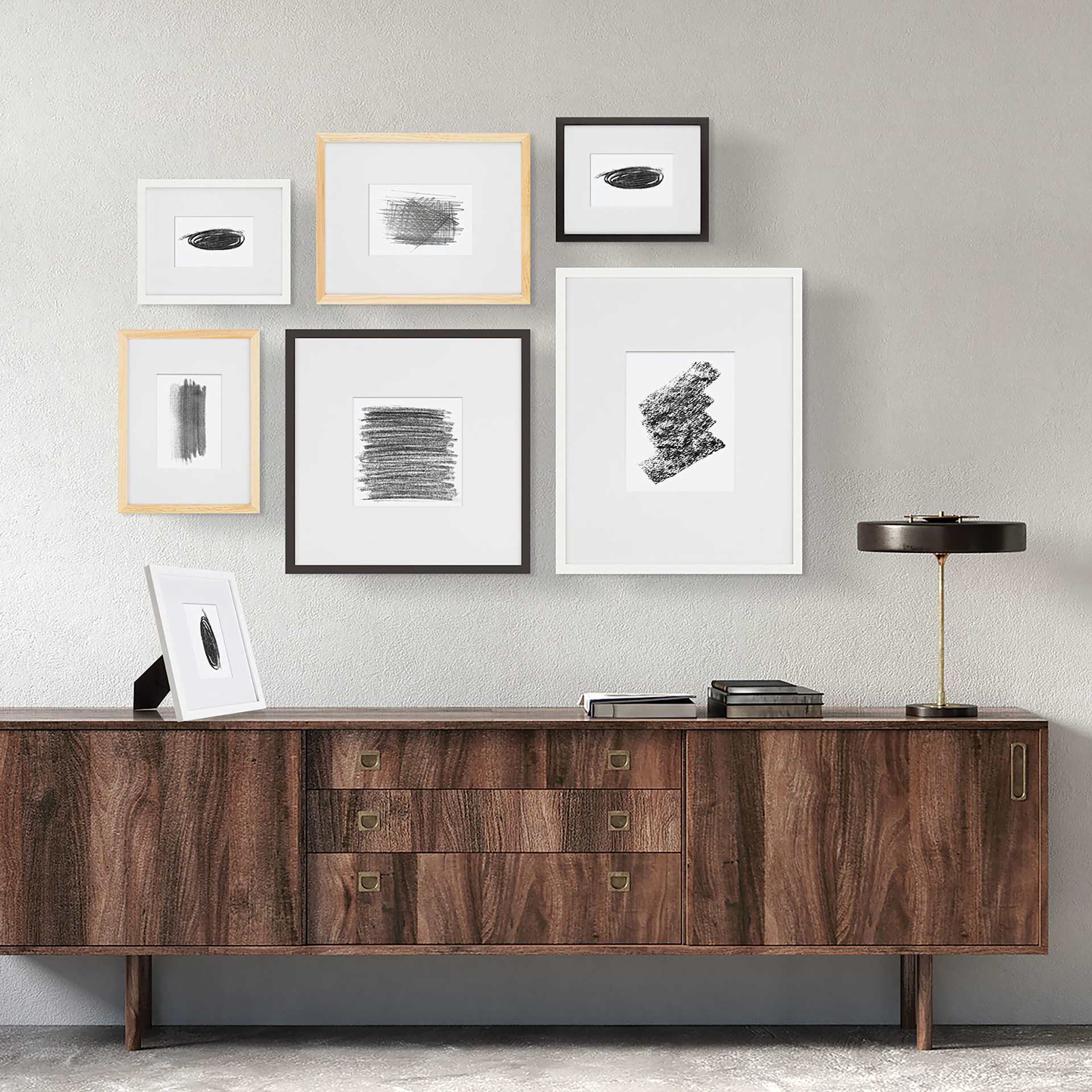 Arrangement of 6 Blick Emery Gallery Frames with Mat above table. Arrangement of 6 Blick Emery Gallery Frames with Mat above table.