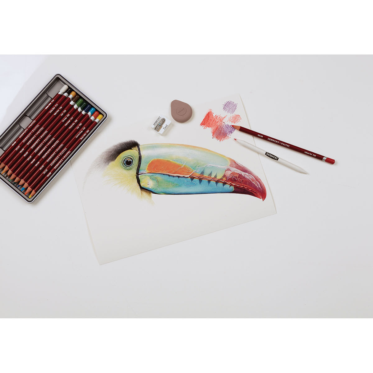 Derwent Pastel Pencils being used to draw a bird. Derwent Pastel Pencils being used to draw a bird.