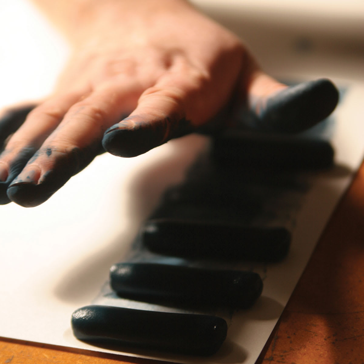 Unison Handmade Pastels (Pastels being hand rolled) Unison Handmade Pastels (Pastels being hand rolled)