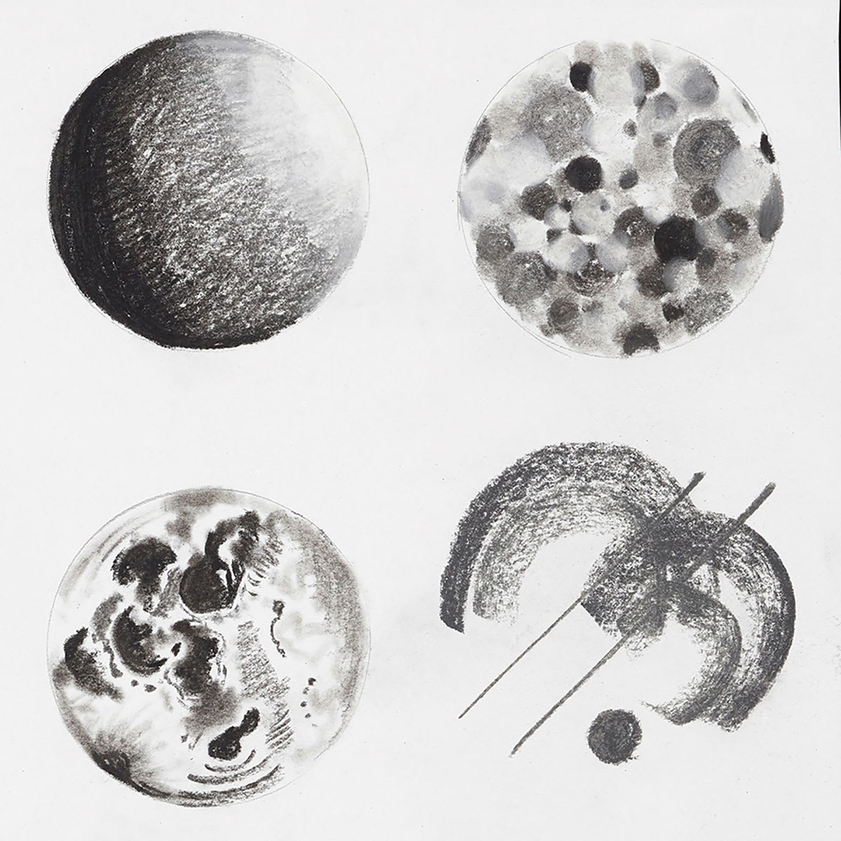 Derwent Charcoal Pencil Set finished art of orbs showing different tones and textures Derwent Charcoal Pencil Set finished art of orbs showing different tones and textures