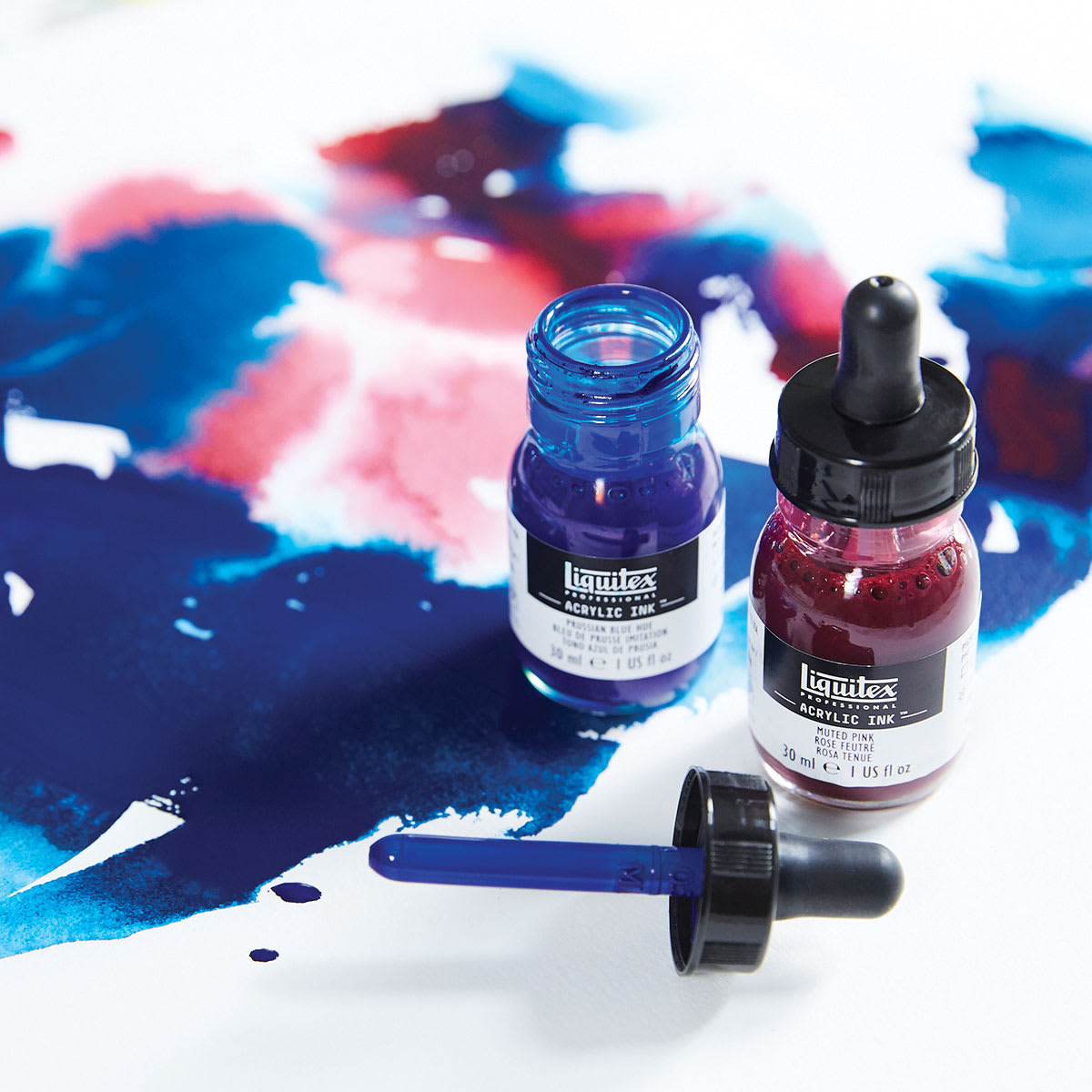 Liquitex Professional Acrylic Inks -Two inks shown with cap off blue bottle