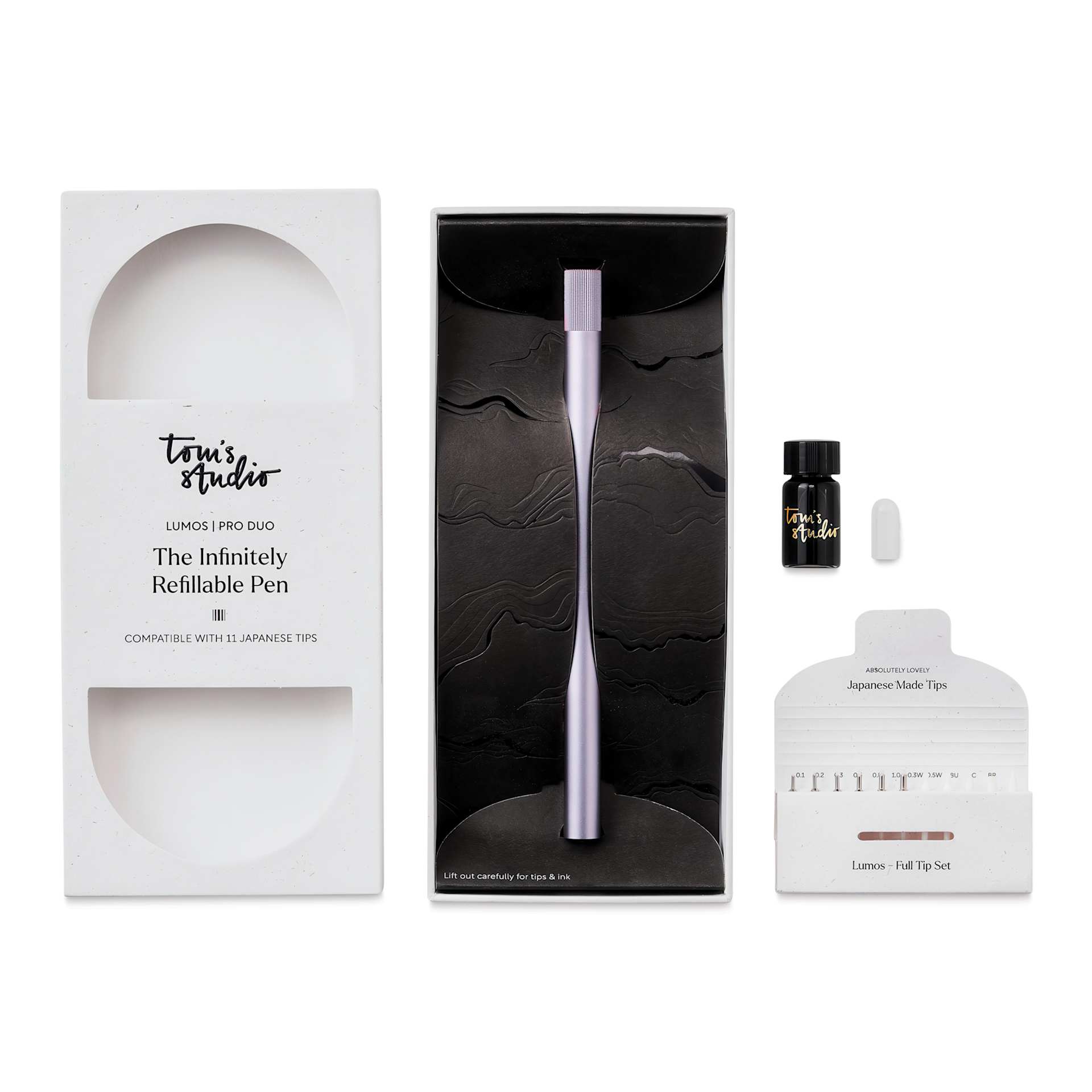 Tom's Studio Lumos Pro Refillable Dual Tip Pen Set - Lilac, pen in packaging and contents laid out