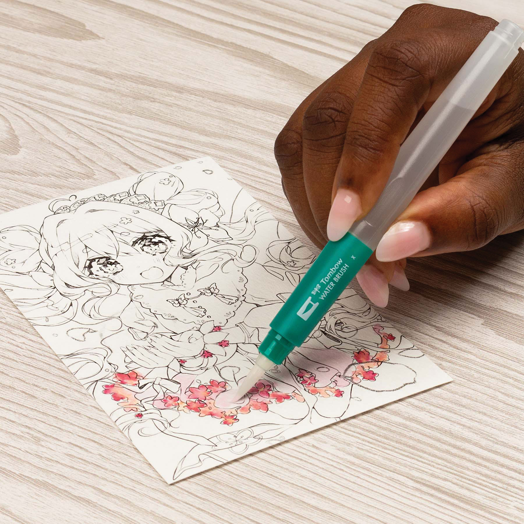 Tombow Dual Brush Manga Illustration Pens - Flower, Kit of 10, waterbrush in hand