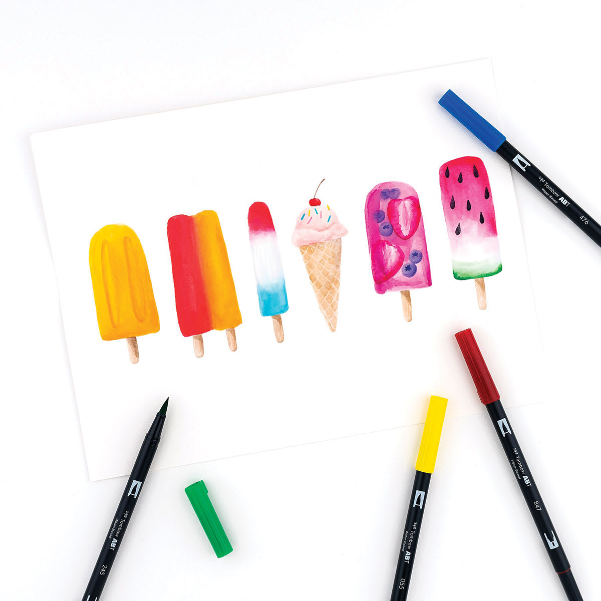 Tombow Dual Brush Pens - Primary Colors, Set of 10. Sample artwork of popsicles and ice cream. Tombow Dual Brush Pens - Primary Colors, Set of 10. Sample artwork of popsicles and ice cream.