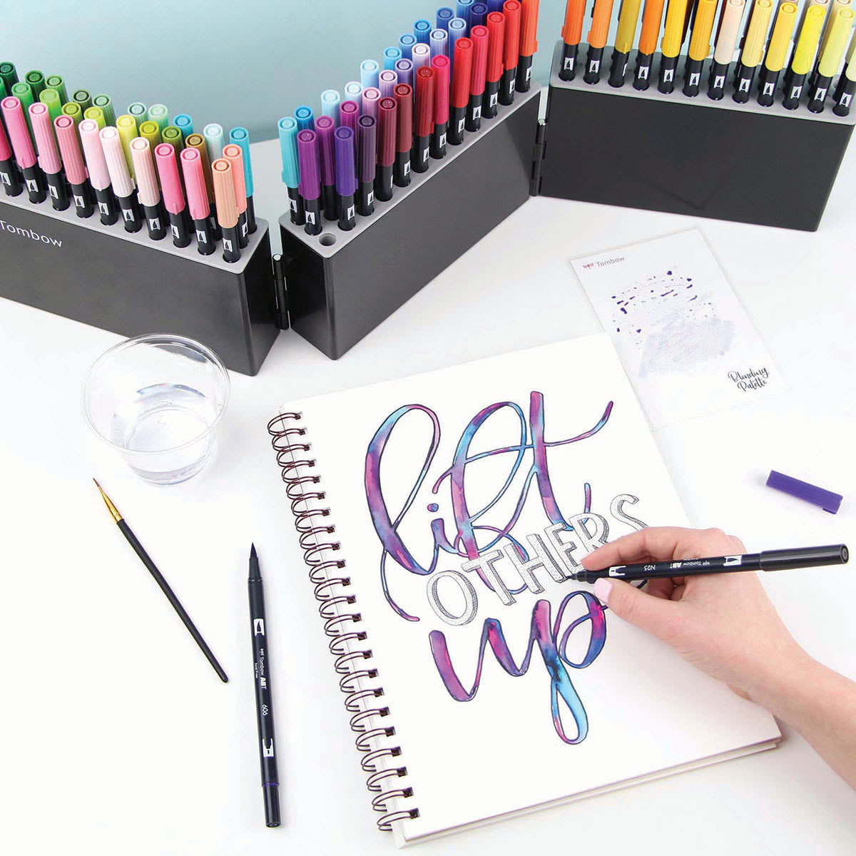 Tombow Dual Brush Pens - Marker Case with 108 Markers. Trays of markers with hand lettering sketch. 