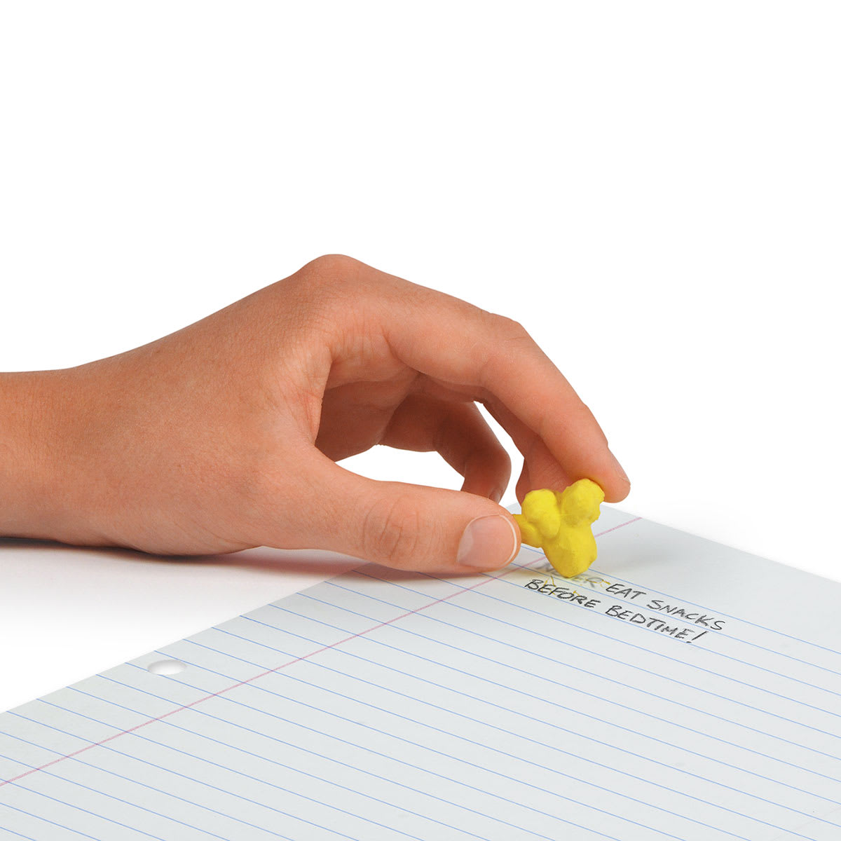 Fred Fresh Popcorn Erasers, hand grasping an eraser 