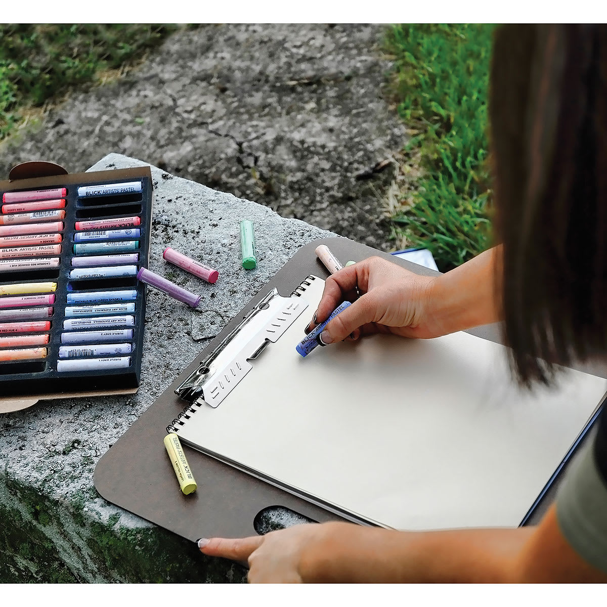 Blick Artists' Soft Pastels, adult drawing with pastels in hand Blick Artists' Soft Pastels, adult drawing with pastels in hand