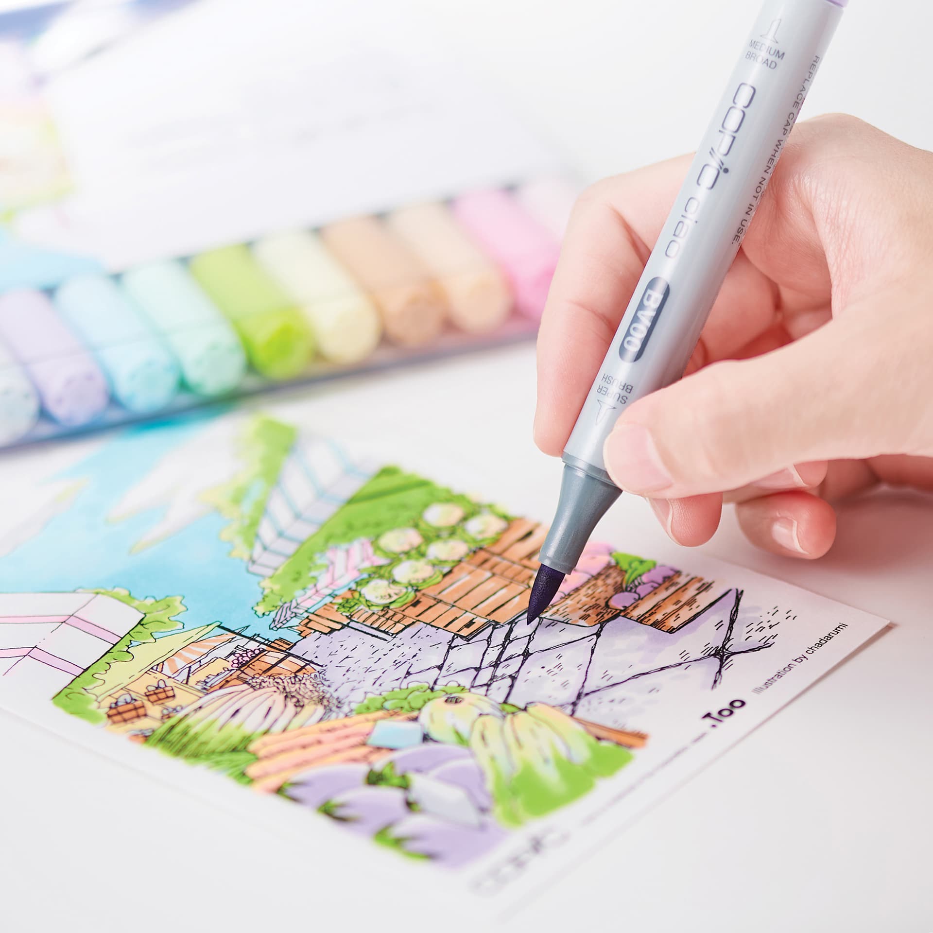 Person using the brush tip of the Copic Ciao Double Ended Marker. Person using the brush tip of the Copic Ciao Double Ended Marker.