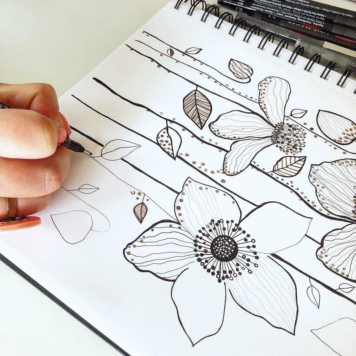 Drawing of flowers being created with Derwent Line Makers 