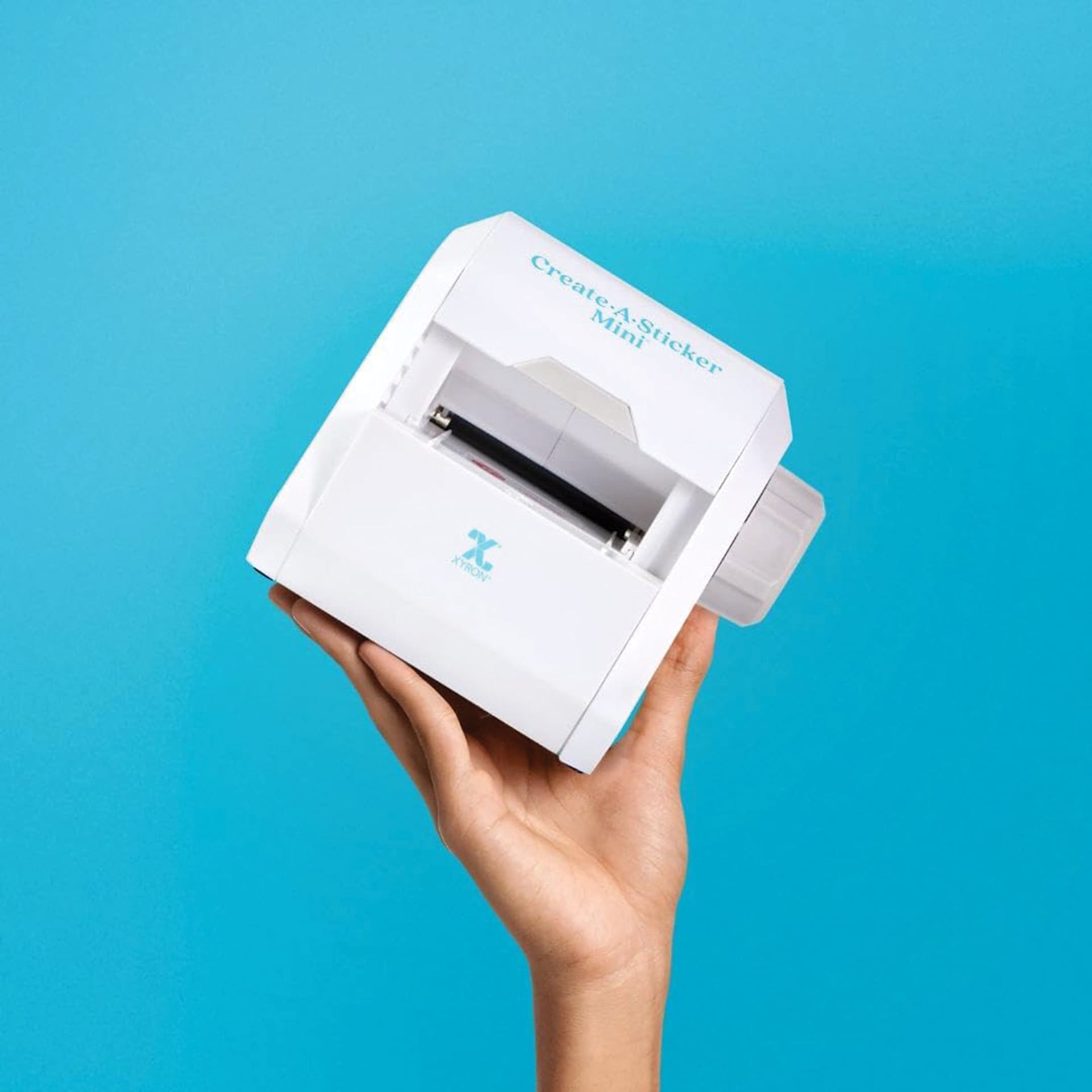 Xyron Create-a-Sticker Mini Sticker Maker, maker in-hand