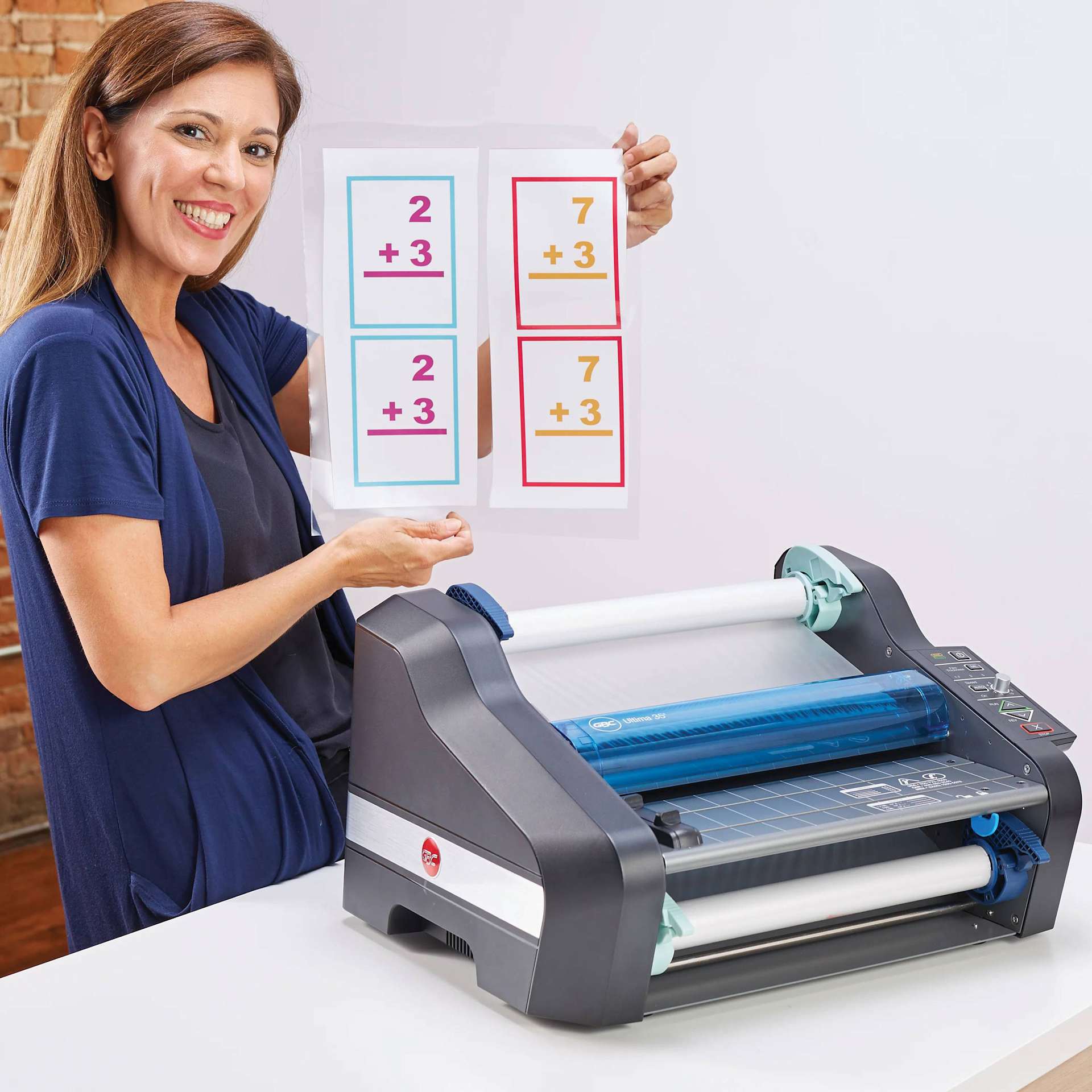 GBC Ultima 35 EZload Laminator - 12" with completed laminations of math problem flashcards