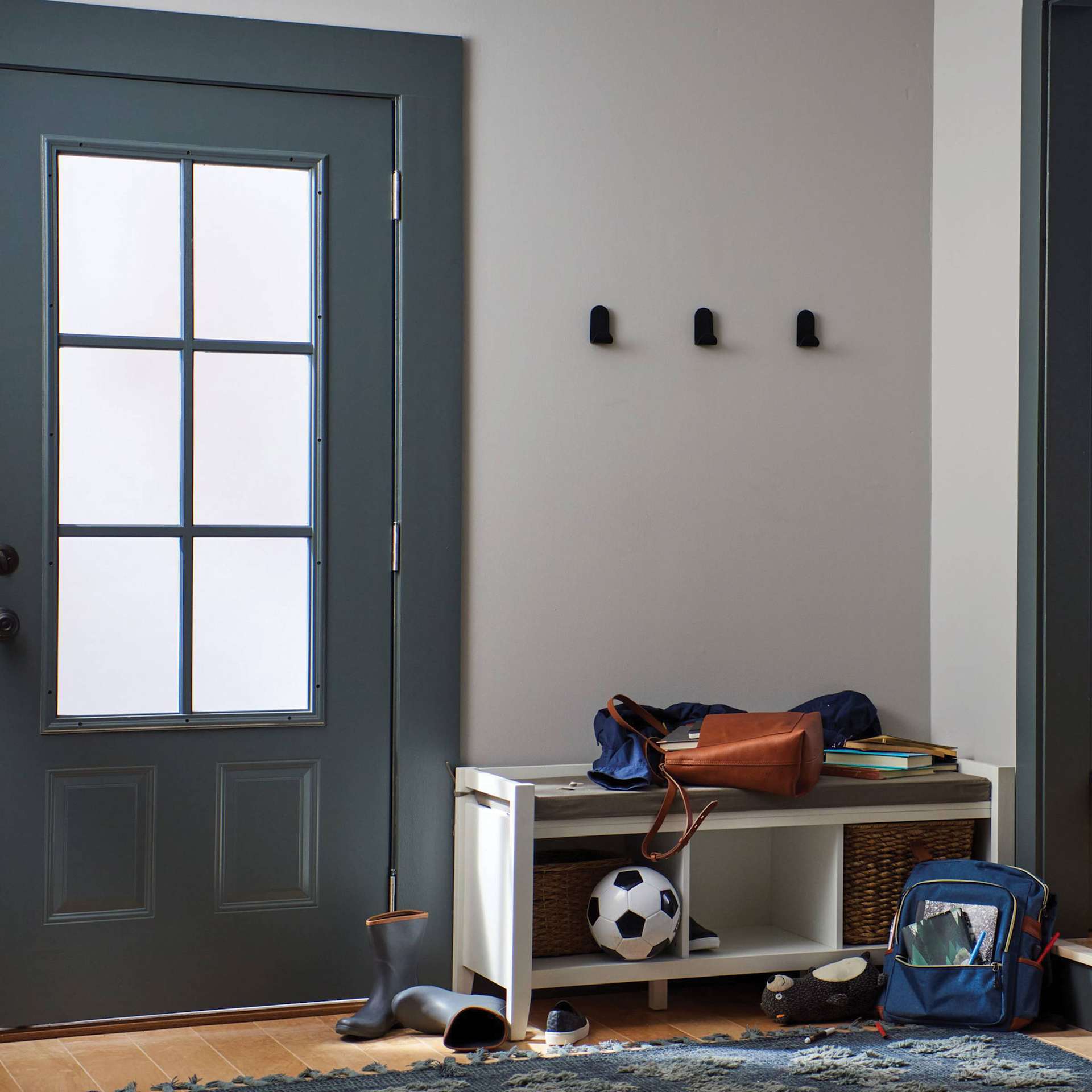 Duck EasyMounts Interior Drywall J-Hook Black (multiple j-hooks installed on wall)