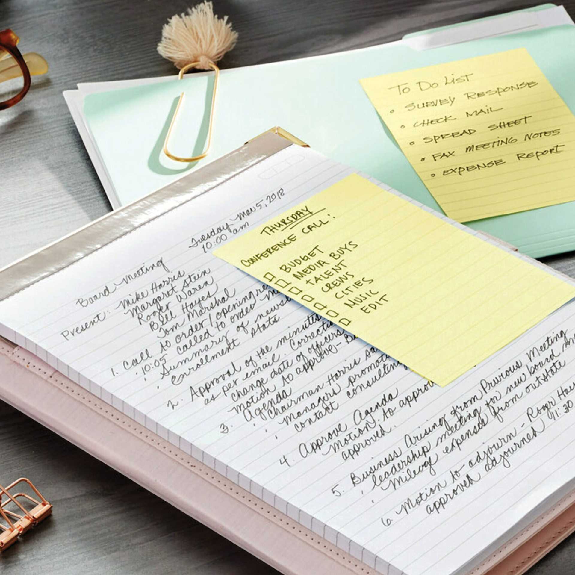 Post-it Recycled Super Sticky Notes - Lined Canary Yellow note, over notebook