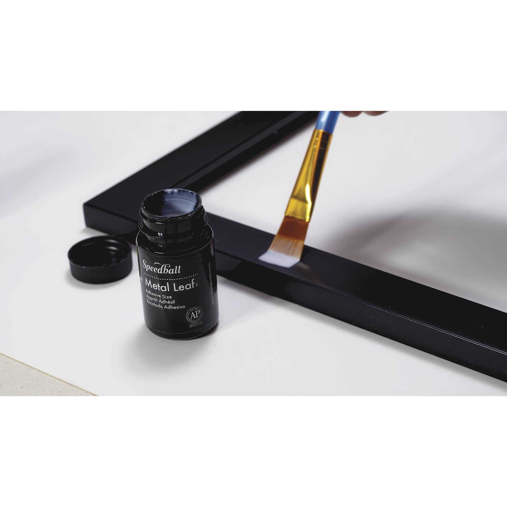 Mona Lisa Composition Gold Leaf Kit adhesive being applied Mona Lisa Composition Gold Leaf Kit adhesive being applied