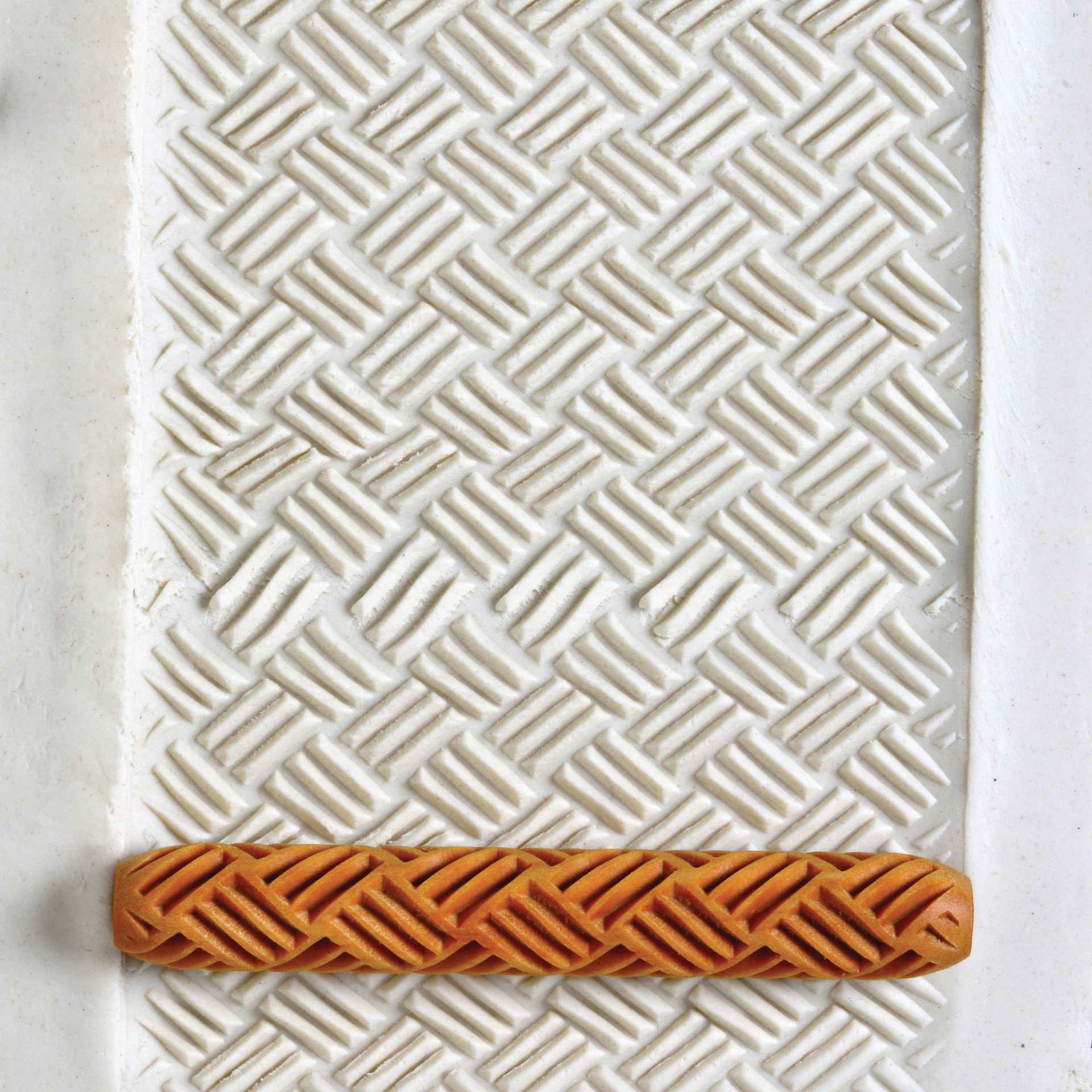 MKM Pottery Tools Hand Roller - Basket Weave 2 applied to clay