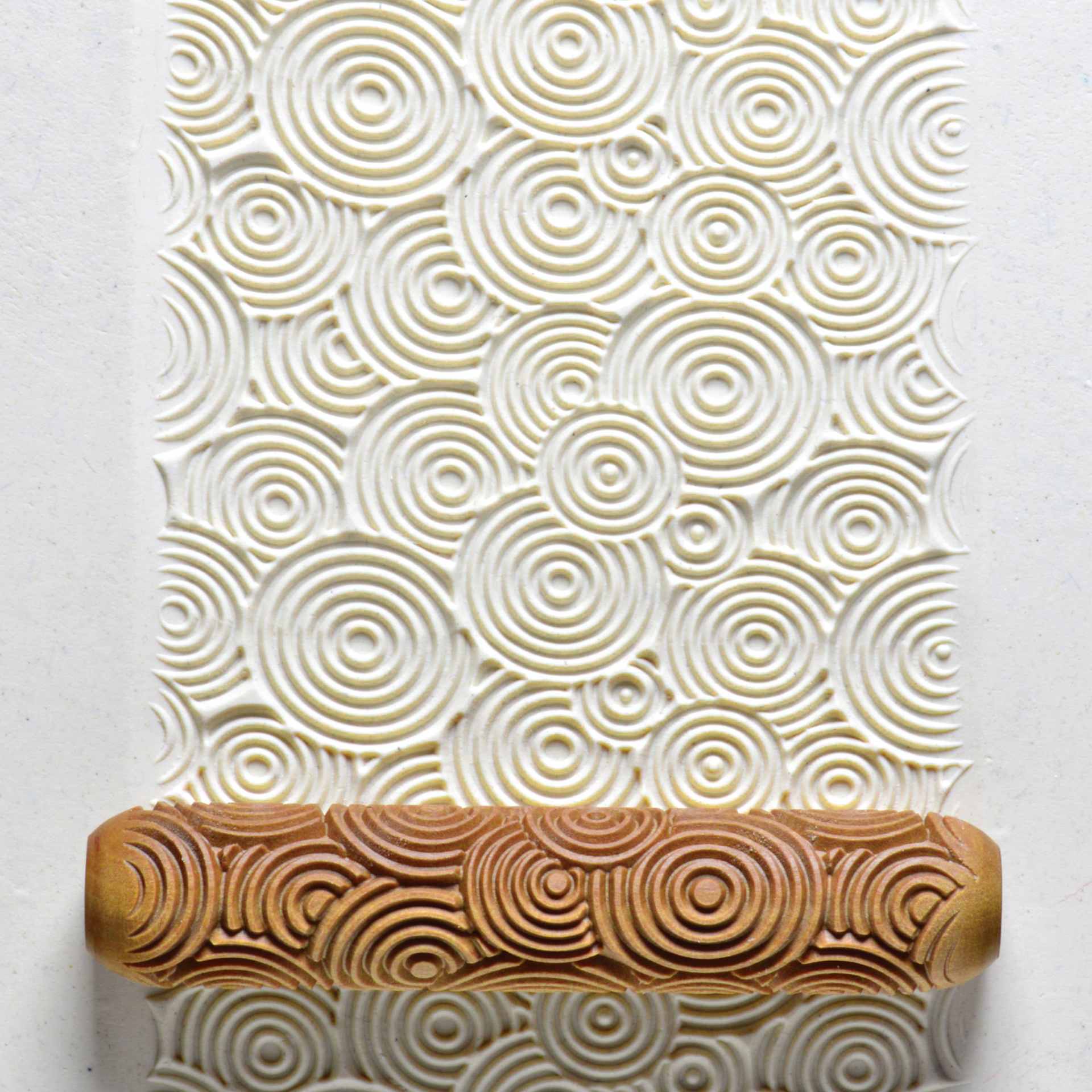 MKM Pottery Tools Big Hand Roller - Big Circles applied to clay